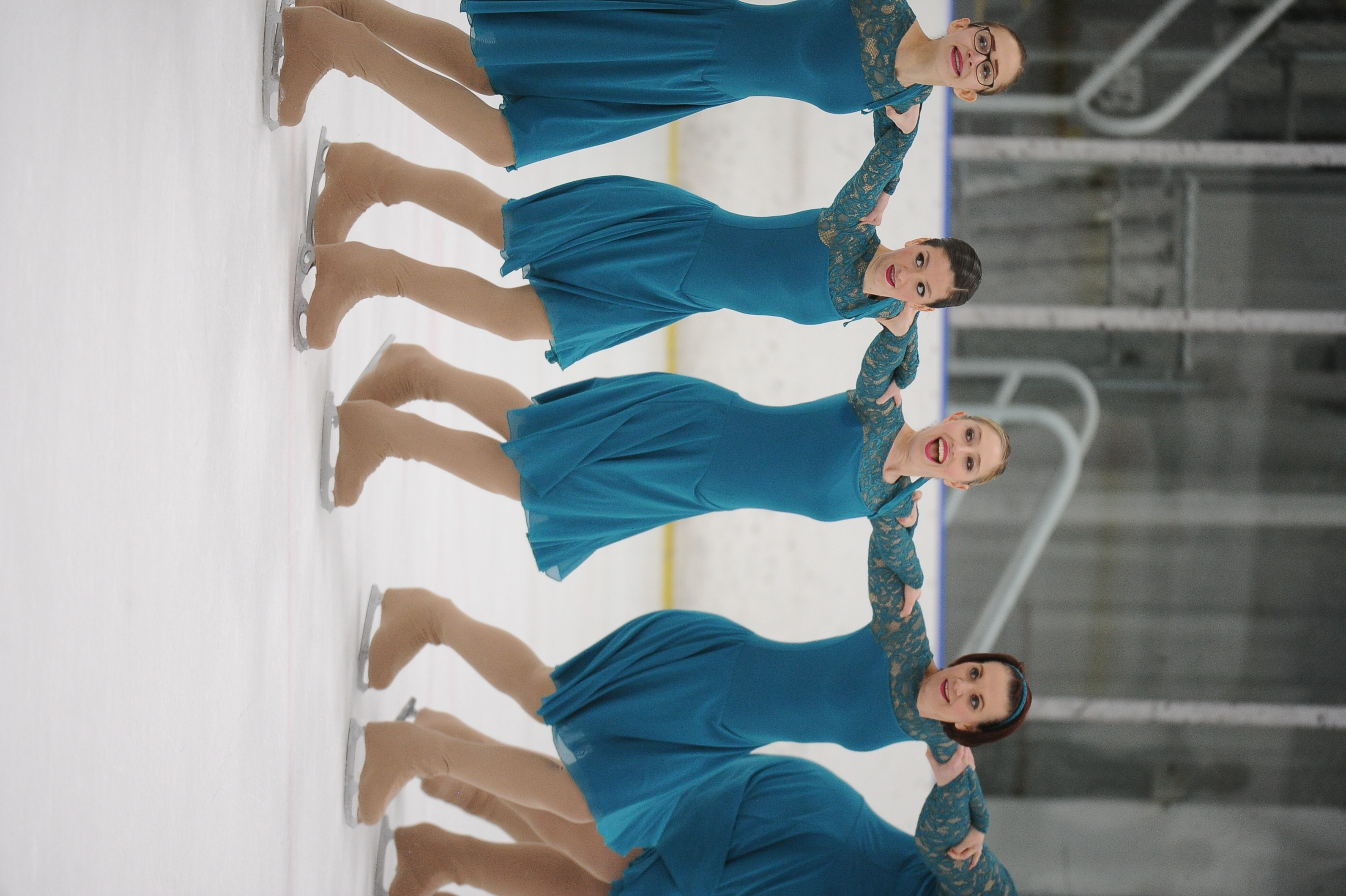Synchronized skaters in a line